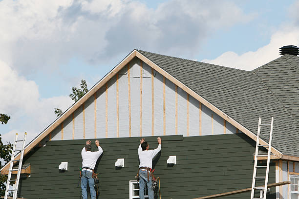 Professional Vinyl Siding technician working in Corning, NY